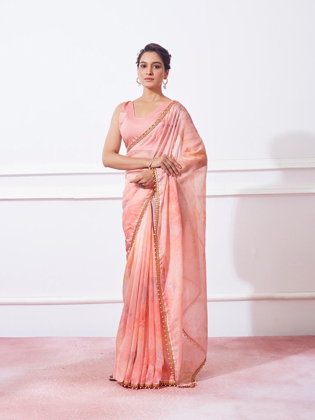 

Mitera Peach-Coloured Tie And Dye Beads & Stones Organza Saree