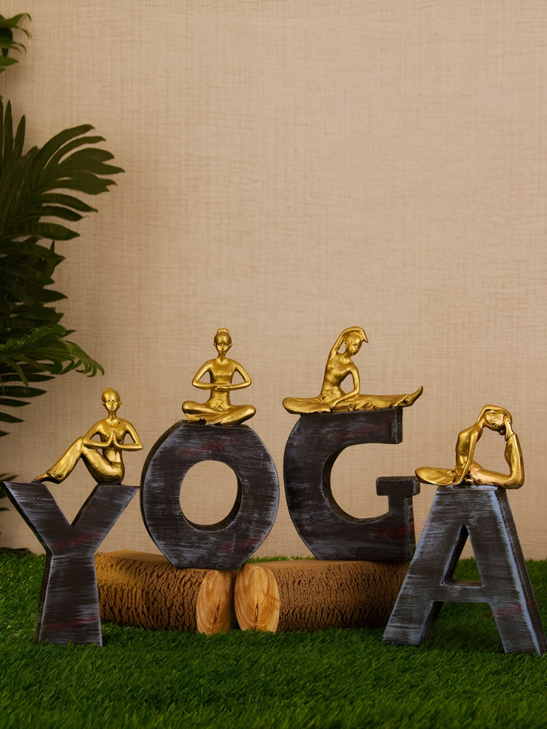 

SANKALAN CREATIONS Gold Toned & Black Yoga Posture Lady Figurine Showpiece