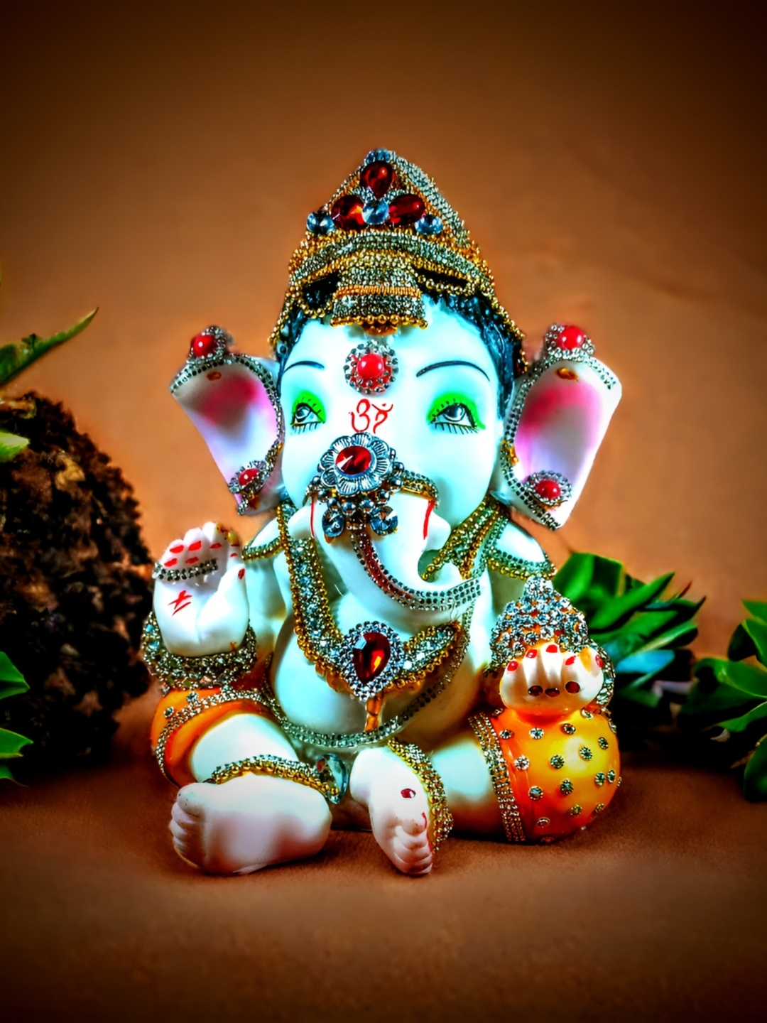 

SANKALAN CREATIONS White & Orange Bal Ganesha Marble Medium Idol Showpiece