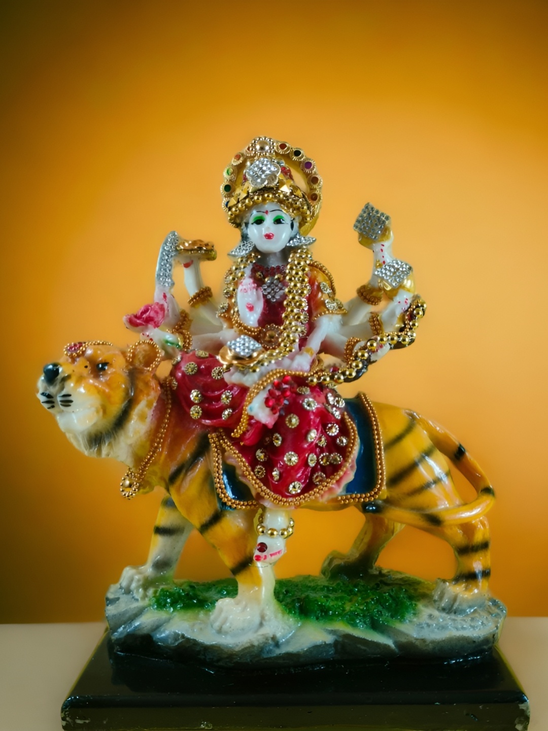 

SANKALAN CREATIONS Red & Gold Toned Idol Showpiece