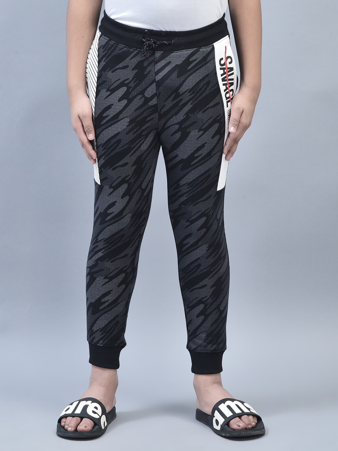 

Crimsoune Club Boys Abstract Printed Mid Rise Joggers, Navy blue