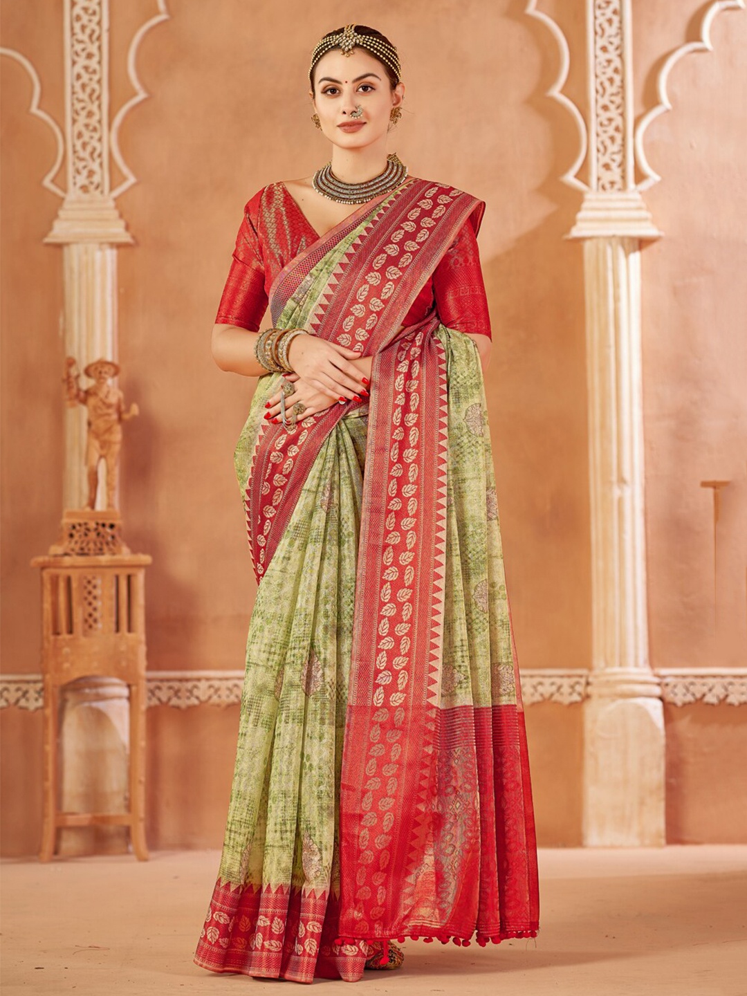 

Mitera Green Ethnic Motifs Printed Pure Silk Saree