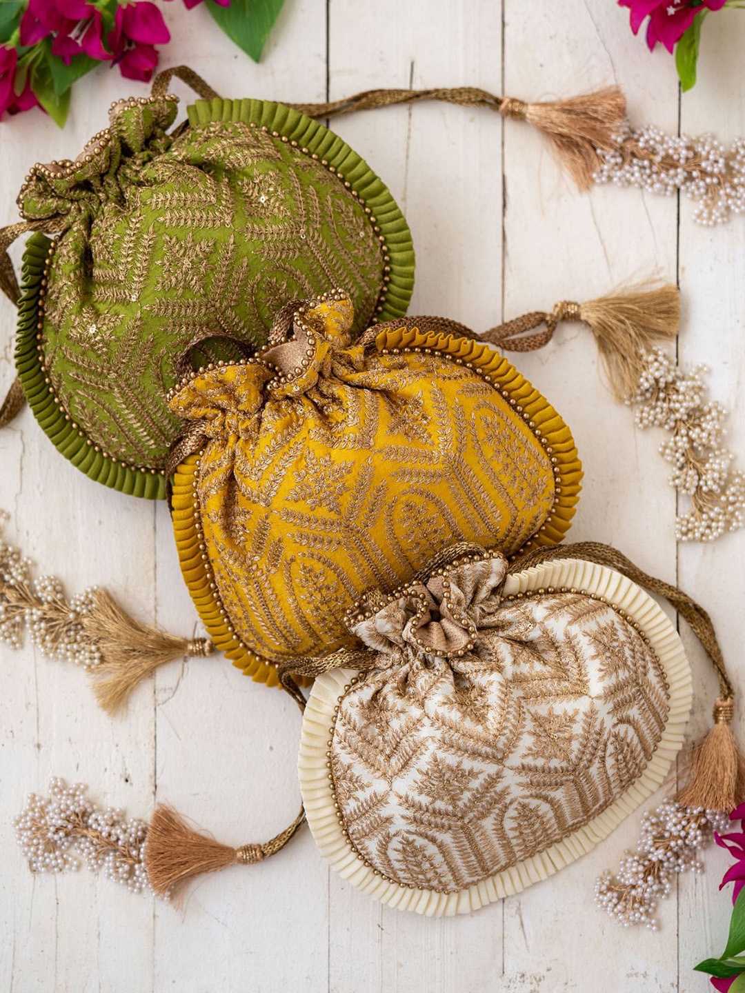 

AMYRA Embroidered Fabric Potli Clutches, Cream