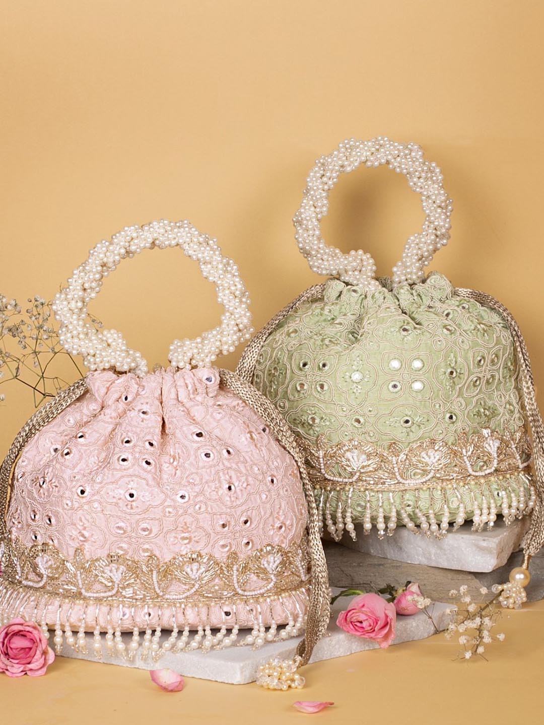 

AMYRA Ethnic Motifs Embellished Potli Clutches, Pink