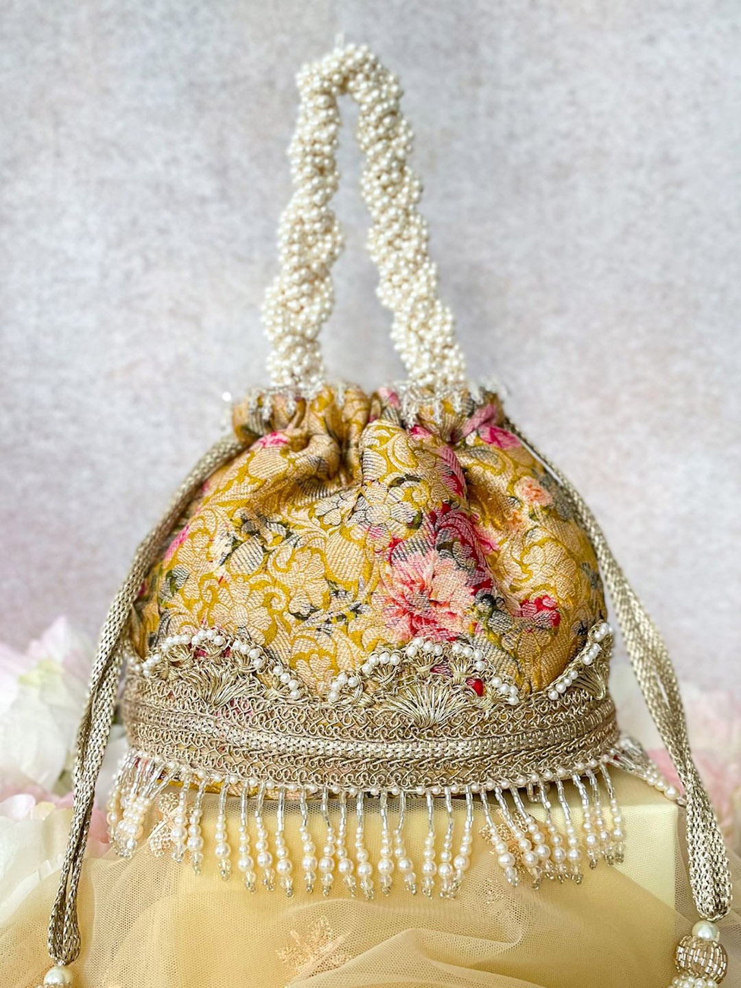 

AMYRA Embellished Potli Bag, Mustard