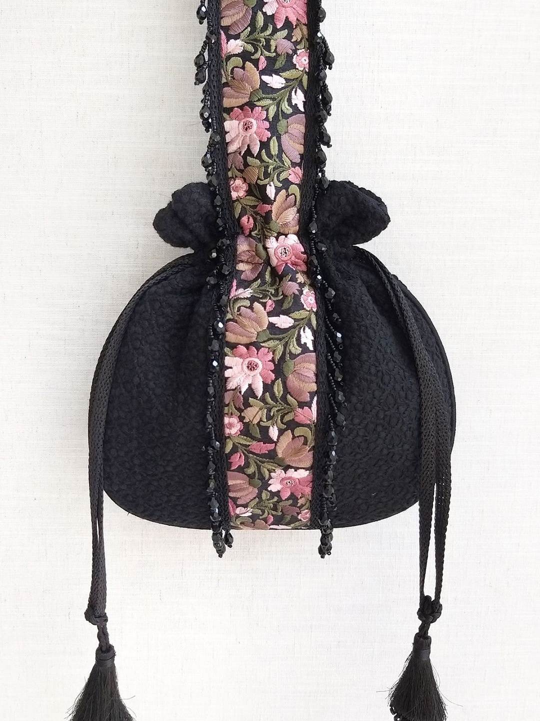 

AMYRA Embroidered Fabric Potli Clutches, Black