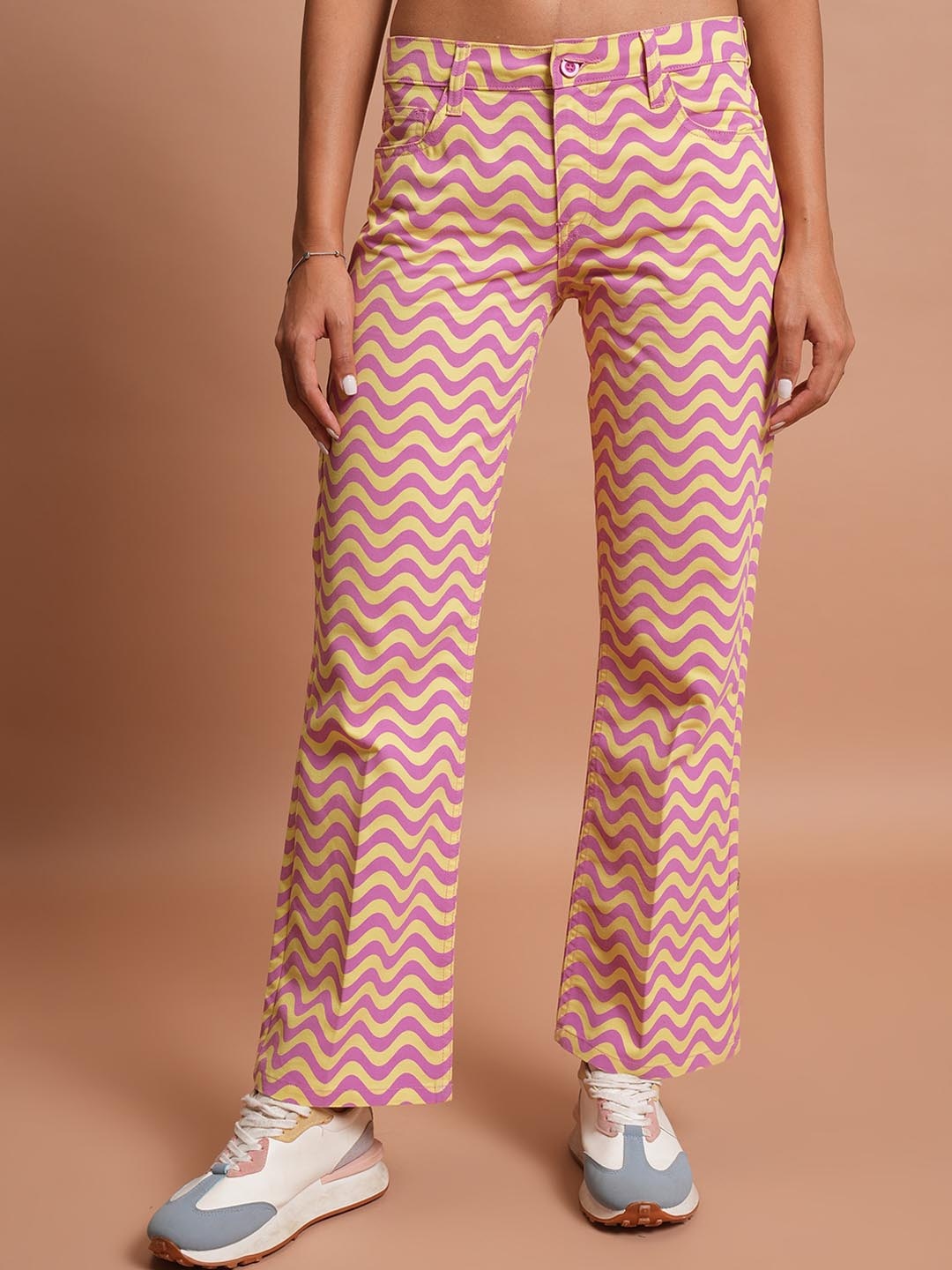 

Tokyo Talkies Women Yellow Geometric Printed Flared Low-Rise Plain Regular Trousers