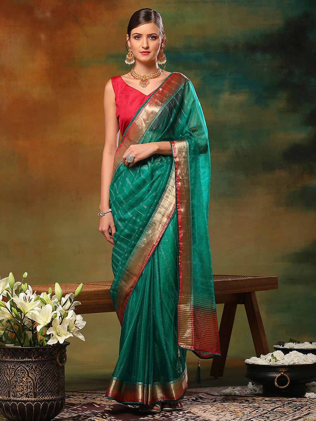 

Anouk Blue Striped Zari Organza Saree