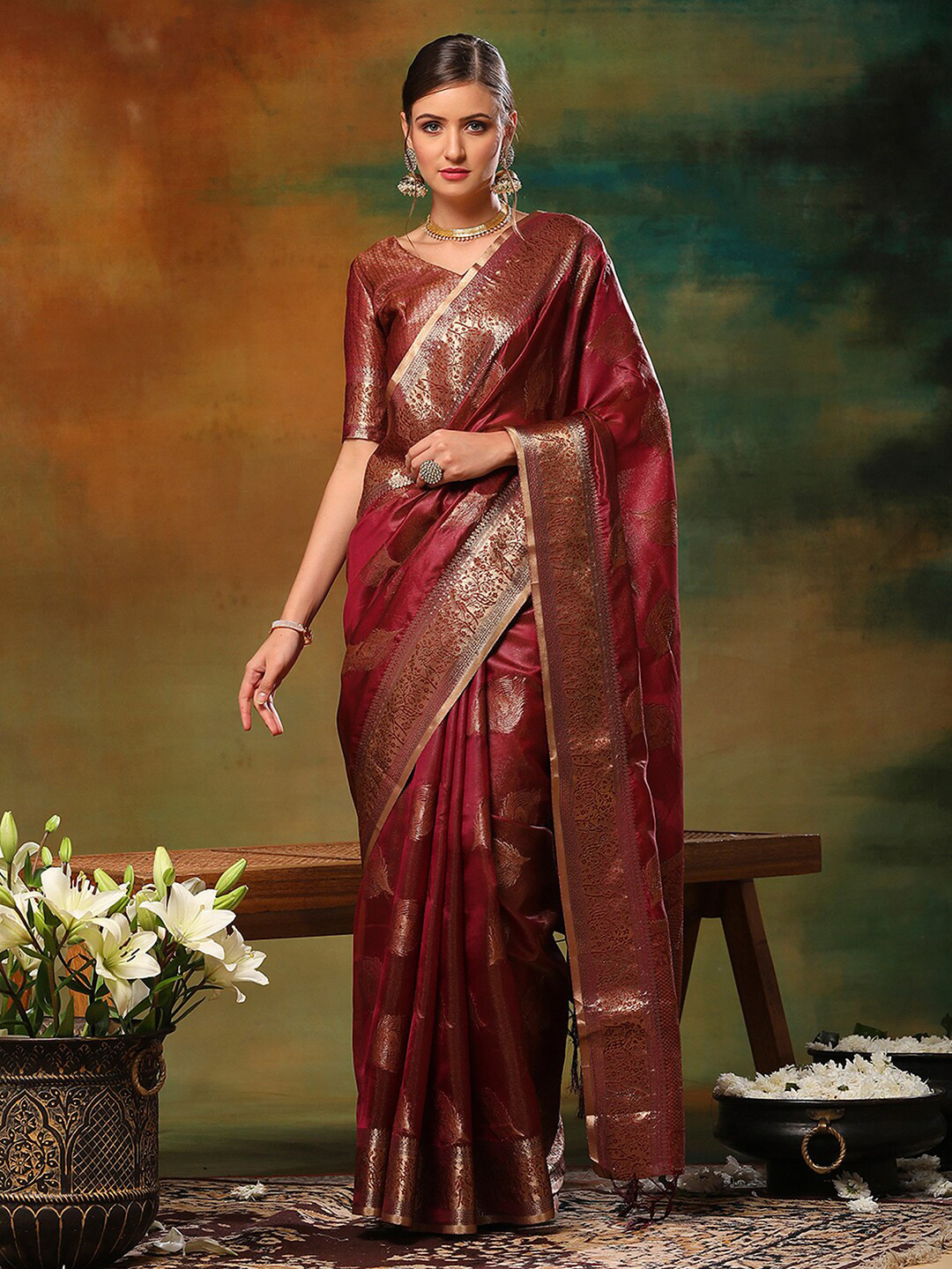 

Anouk Burgundy Ethnic Motifs Woven Design Zari Organza Banarasi Saree