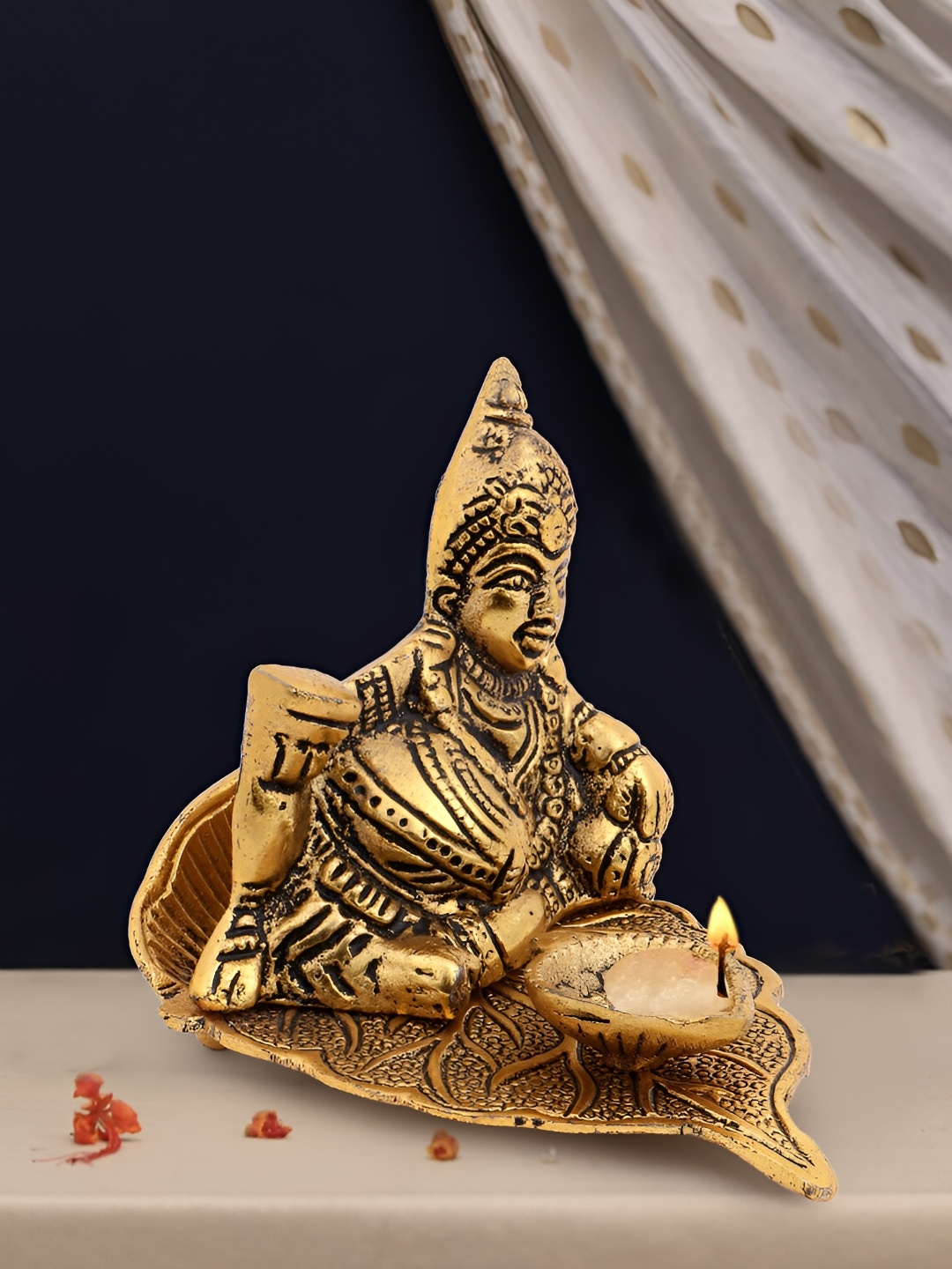 

INTERNATIONAL GIFT Gold Toned Religious Maharaja Kuber With Leaf Metal Showpiece