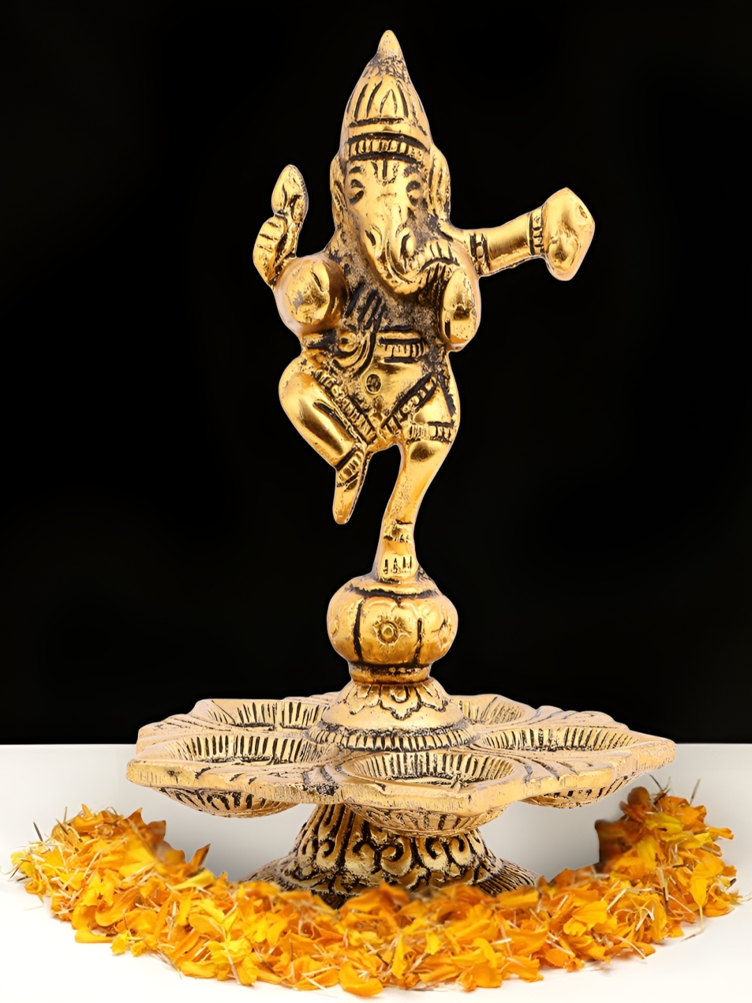 

INTERNATIONAL GIFT Gold Toned Dancing Ganesha Idol Showpiece