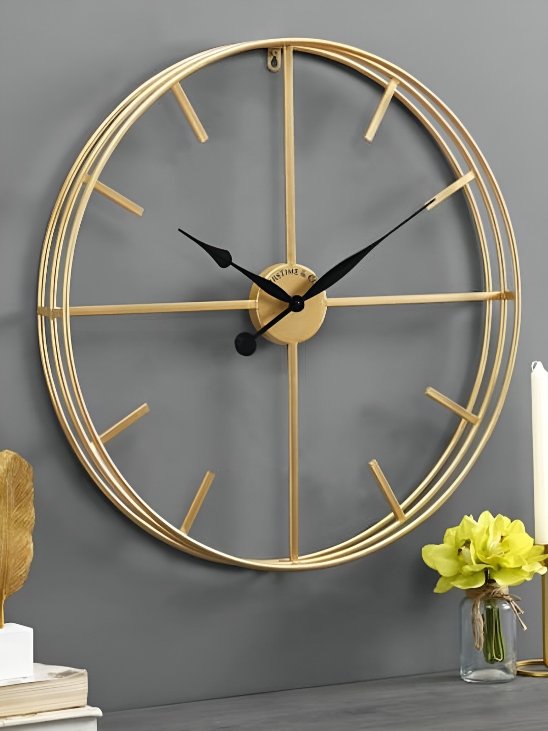 

Writings On The Wall Gold-Toned Solid Round Contemporary Wall Clock
