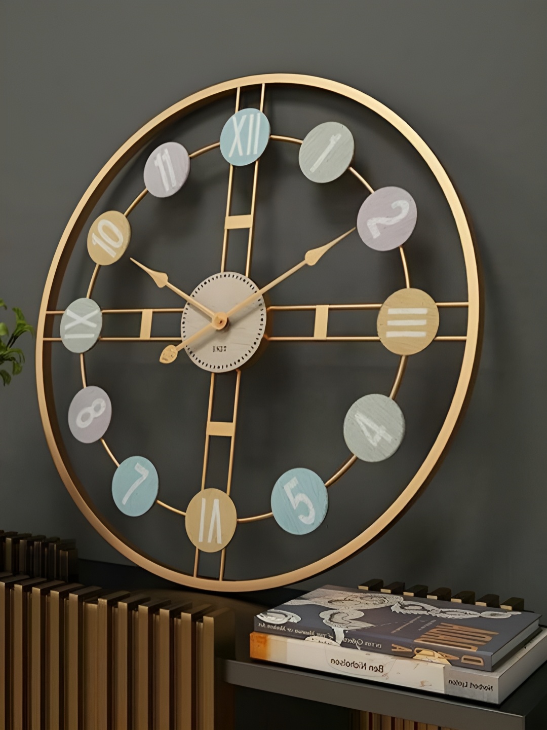 

Writings On The Wall Gold Toned Contemporary Wall Clock