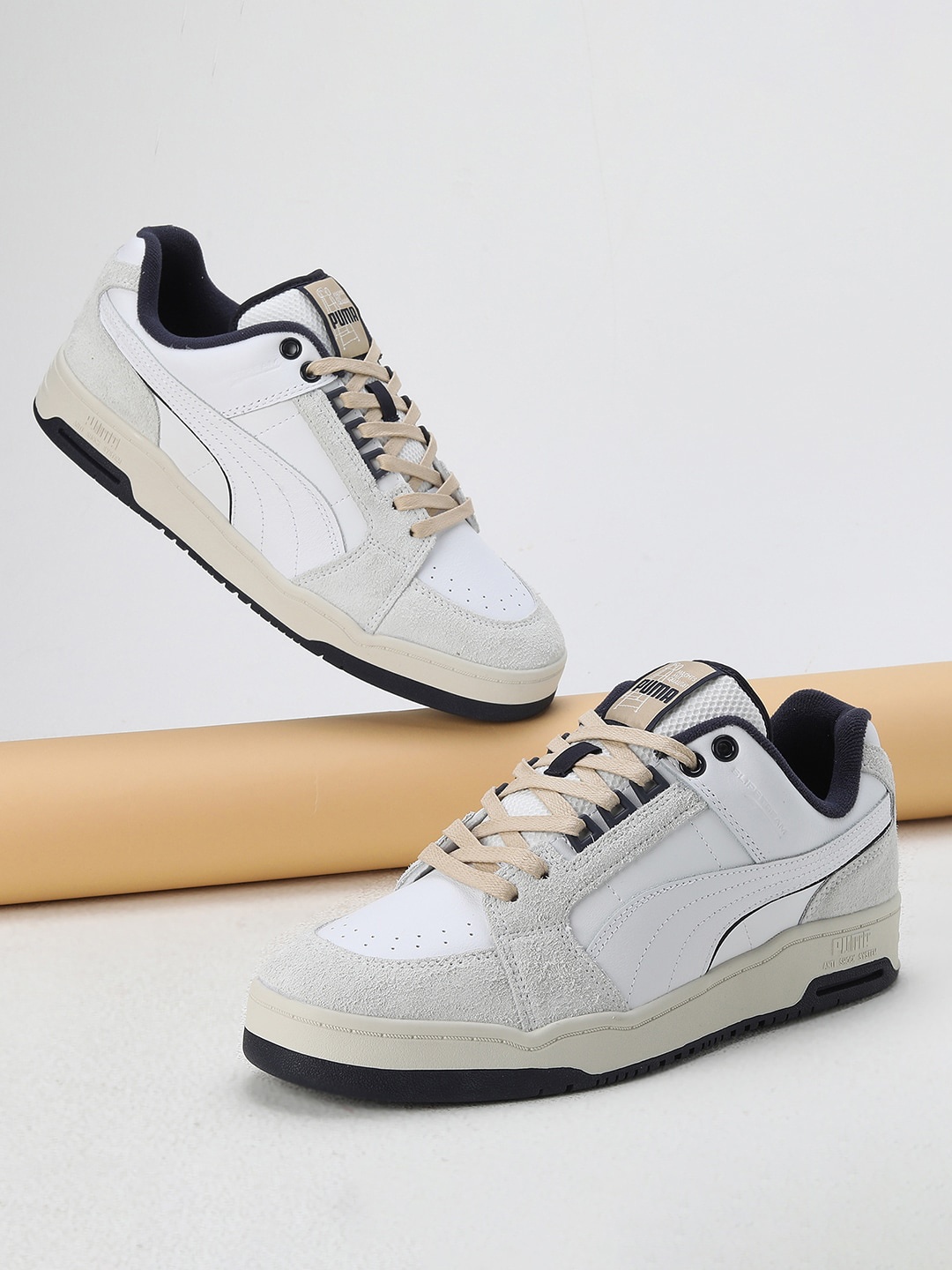 

Puma Unisex MMQ Service Line Slipstream Lo Sneakers, White