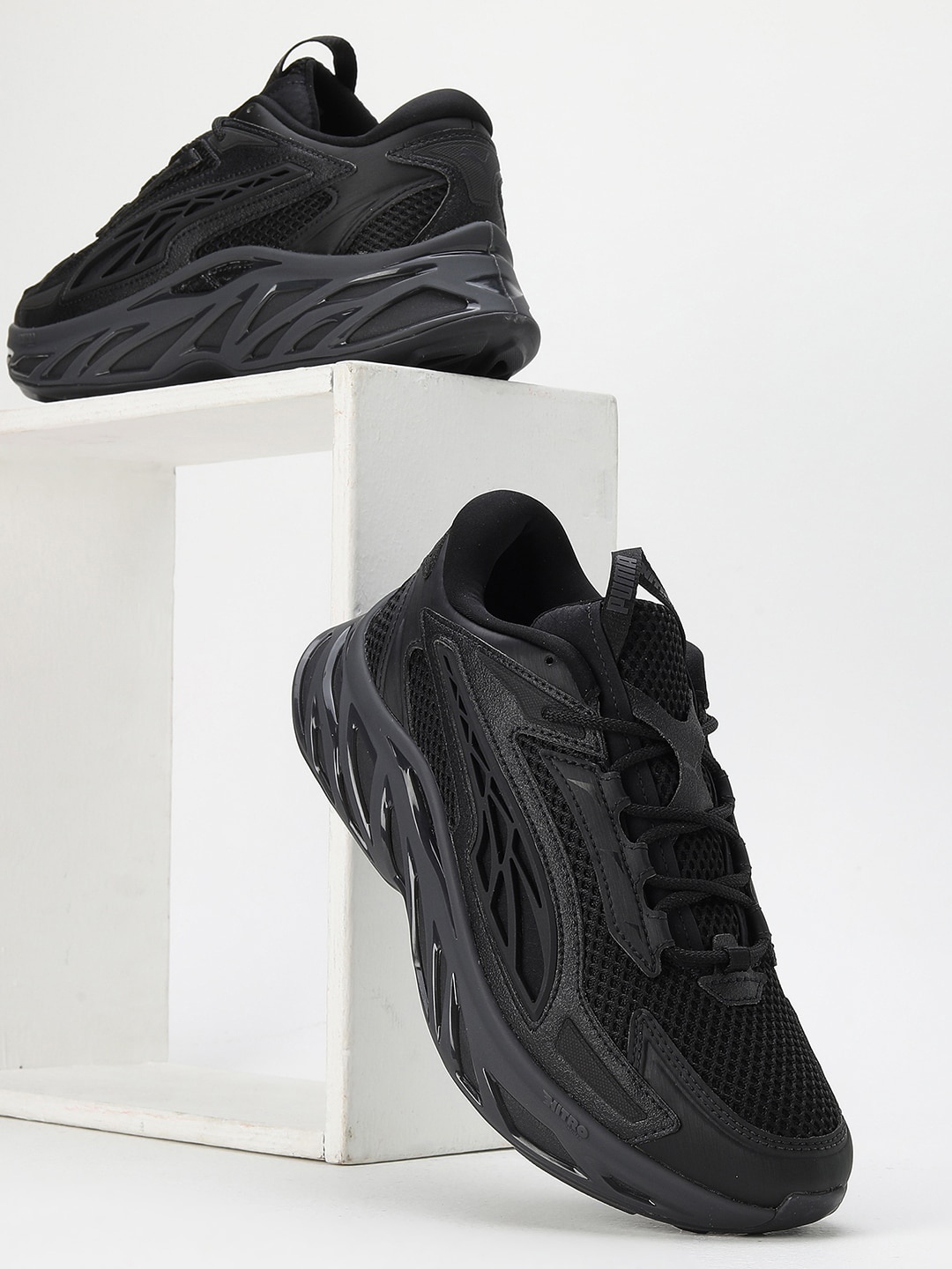 

Puma Unisex Exotek NITRO Textured Lace-Up Sneaker, Black