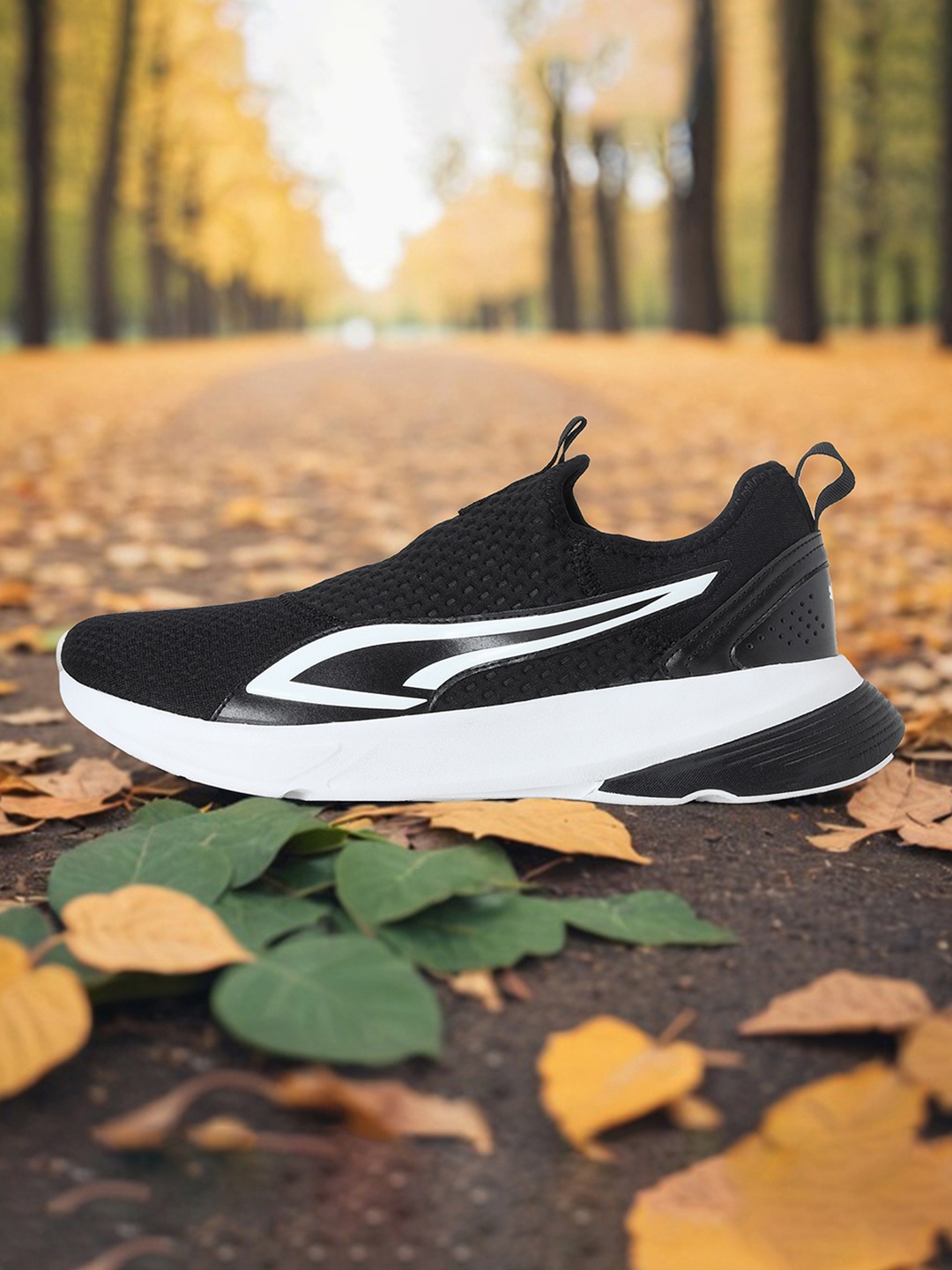 

Puma Men Asteride Slip On Sneakers, Black