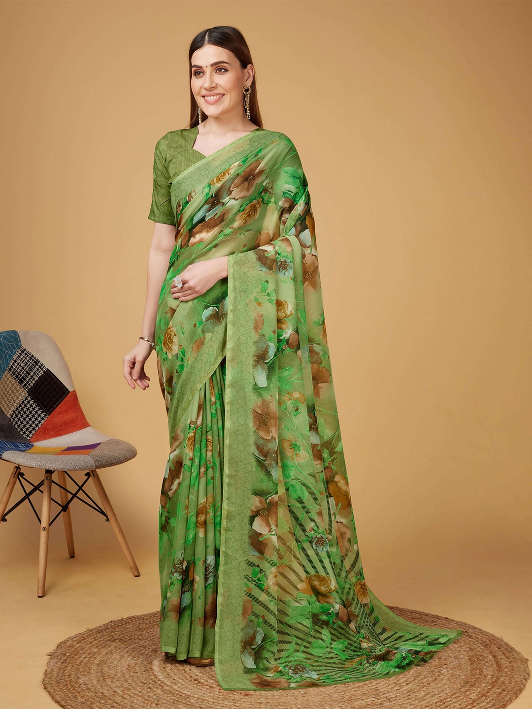 

Mitera Green & Brown Floral Printed Pure Georgette Saree