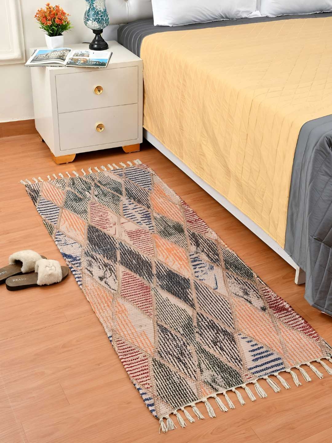 

HOMADORN Beige & Orange Rectangular Printed Floor Dhurries