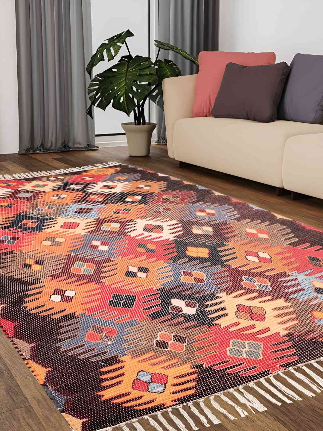 

HOMADORN Orange & Red Geometric Rectangular Printed Floor Dhurries