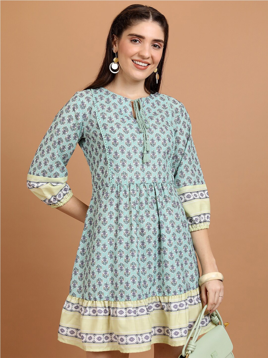 

Vishudh Blue Floral Printed Tie-Up Neck Puffed Sleeves Fit & Flare Mini Dress