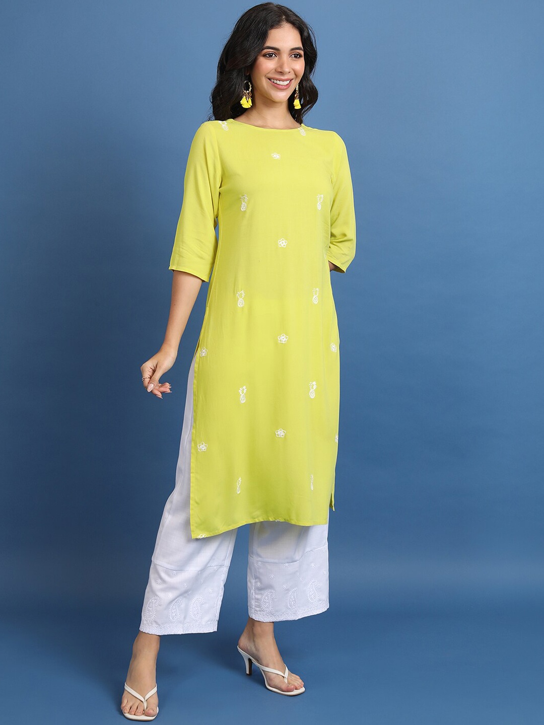 

Vishudh Yellow Floral Embroidered Straight Kurta