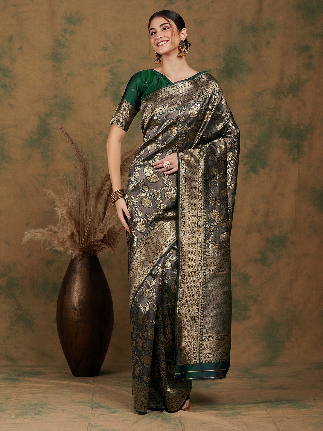 

Sangria Green Floral Woven Design Zari Banarasi Saree