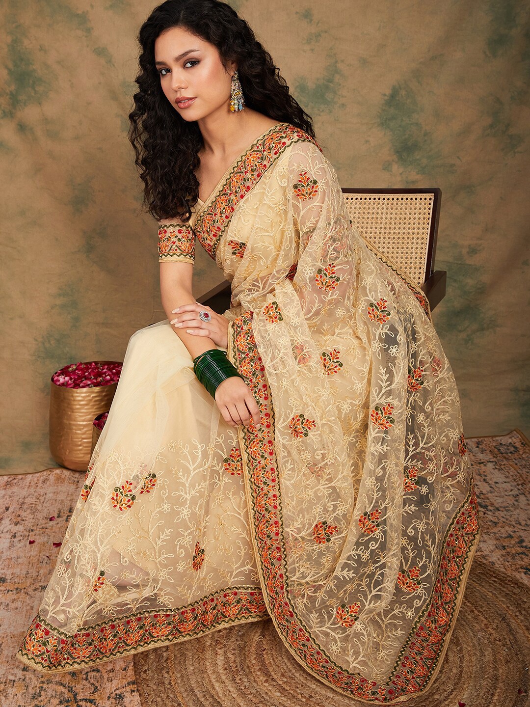 

Sangria Yellow Beige Embroidered Net Sarees