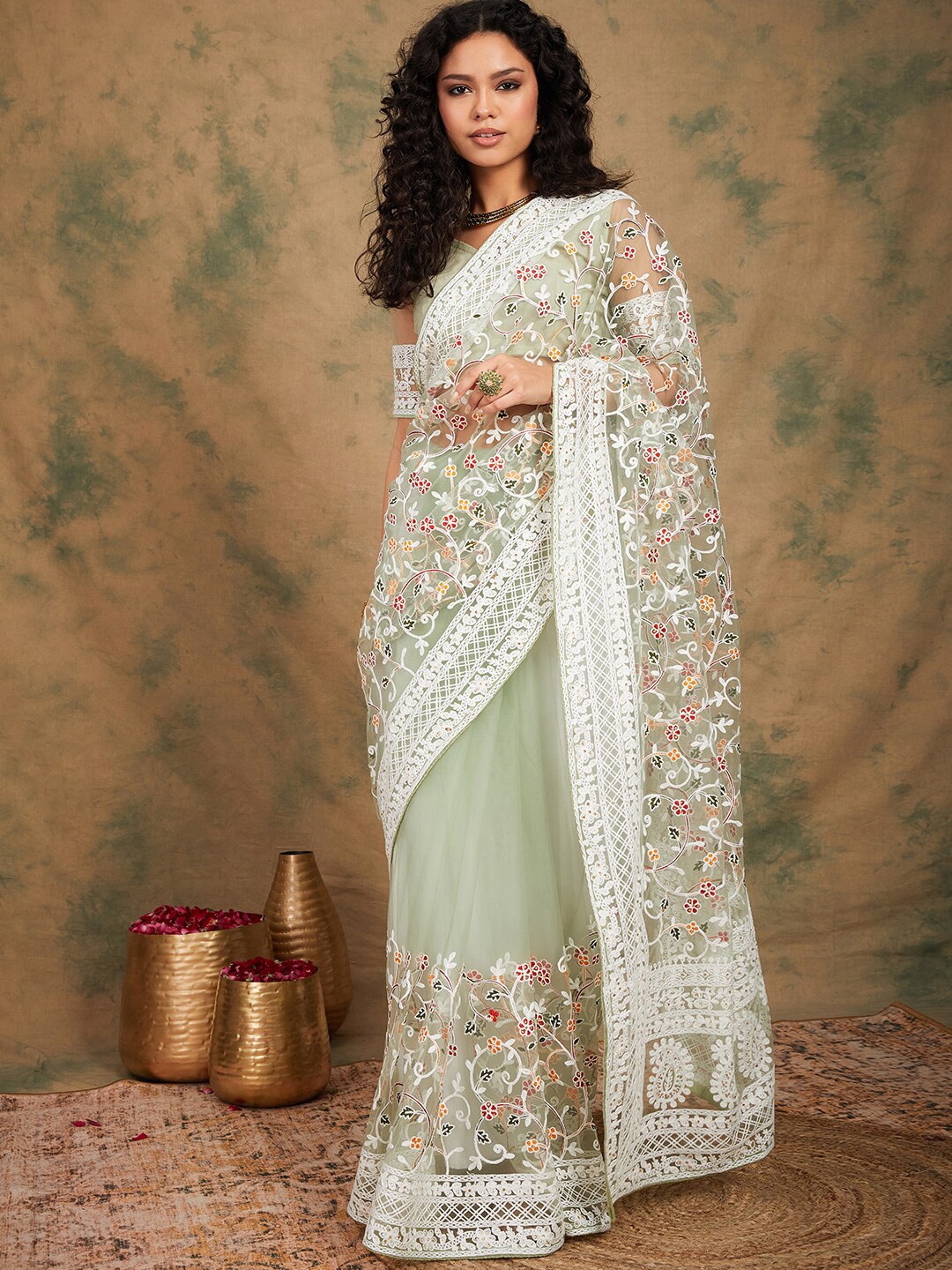 

Sangria Green Floral Embroidered Net Saree