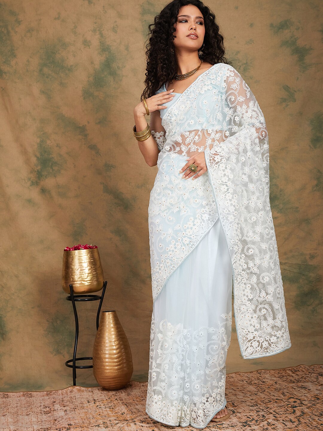 

Sangria Blue Ethnic Motifs Beads & Stones Embroidered Net Saree