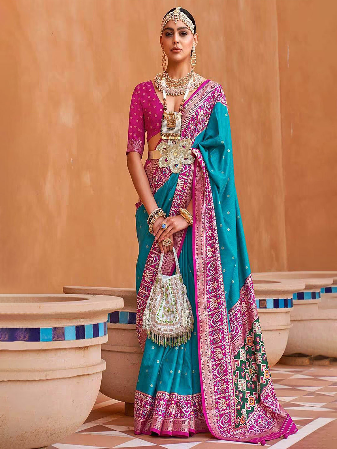 

Ekta Textiles Ethnic Motifs Woven Design Zari Pure Silk Patola Saree, Turquoise blue