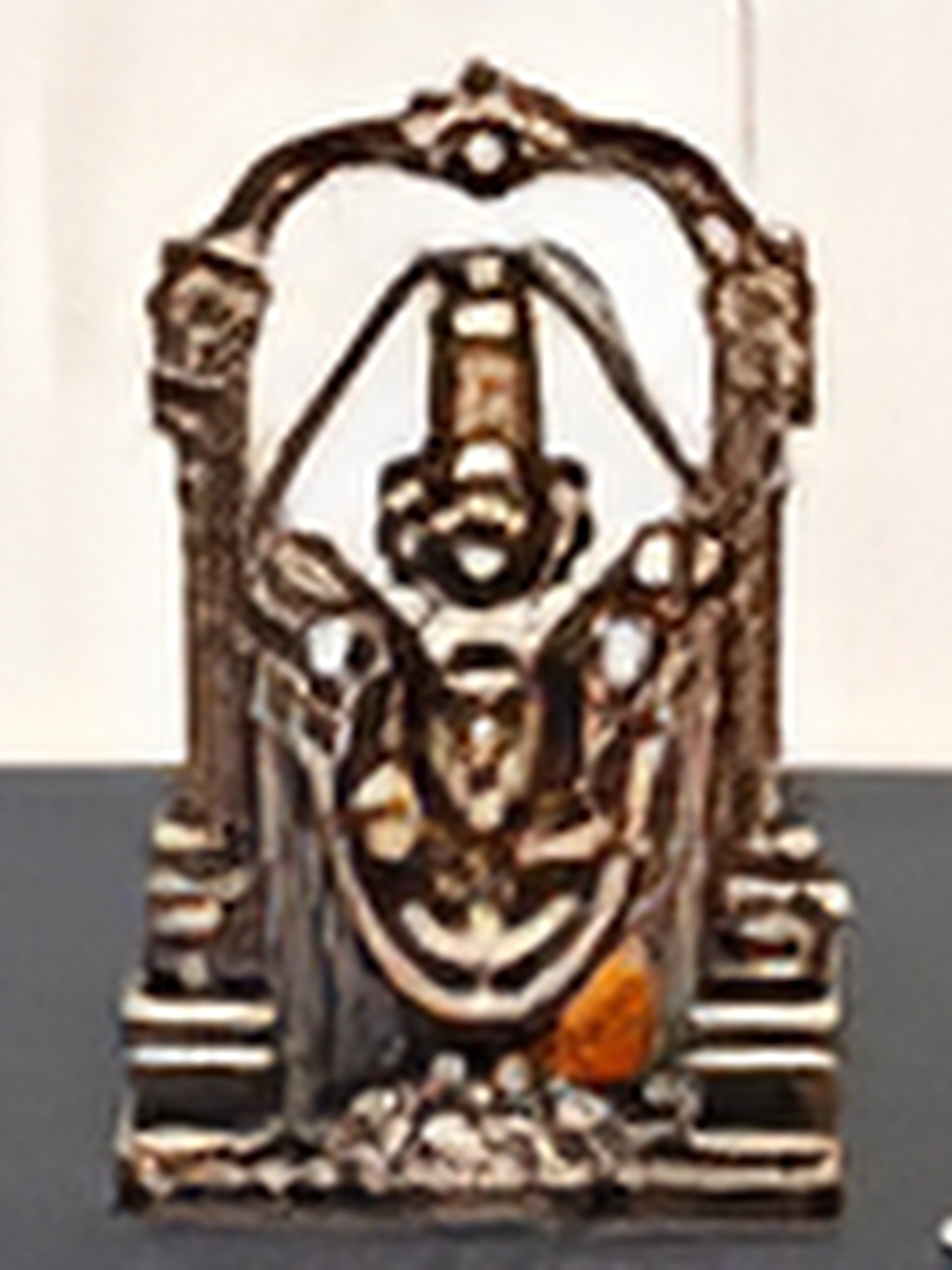 

Bhimonee Decor Copper Toned Balaji Idol Showpiece