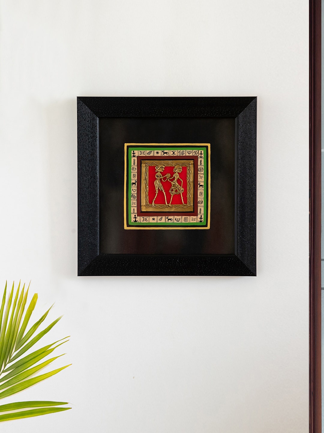 

ExclusiveLane Navy Blue & Red Dhokra Warli Wall Decor