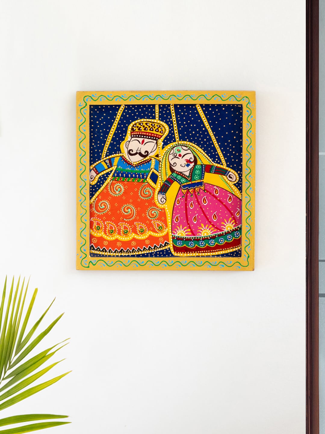 ExclusiveLane Red & Blue Rajasthani Puppets Painted Wooden Wall Hanging