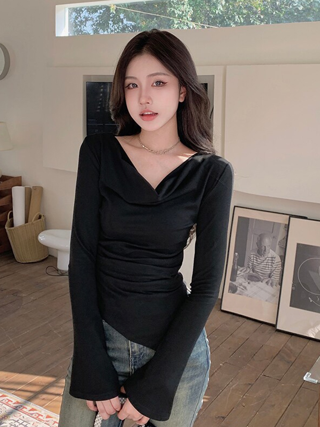 

StyleCast Black Cowl Neck Asymmetrical Hem Top