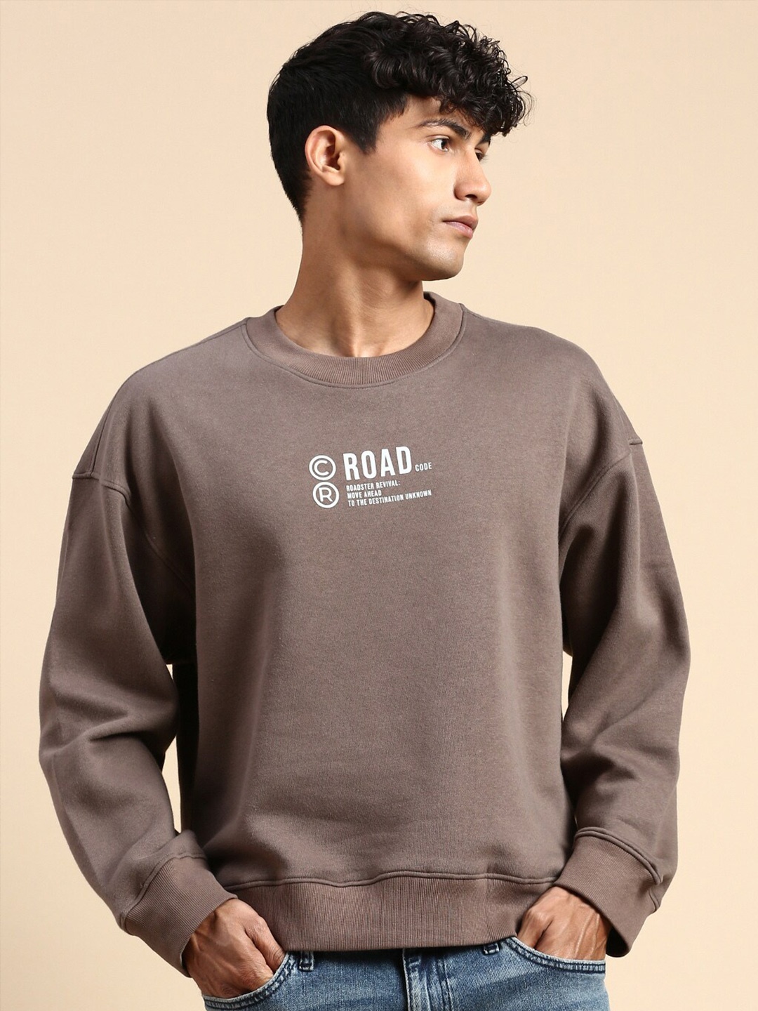 

The Roadster Lifestyle Co. Camel Brown Typography Printed Oversized Fit Basic Sweatshirt