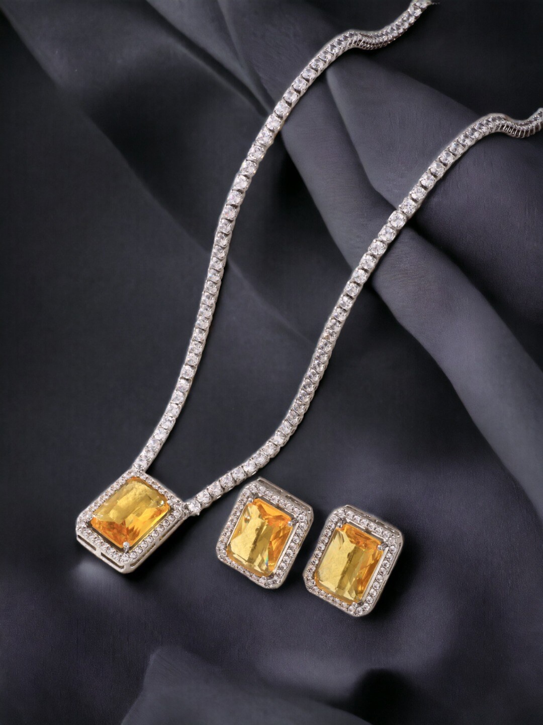 

Jewels Galaxy American Diamond Studded Silver-Plated Rectangular Necklace With Earrings, Yellow