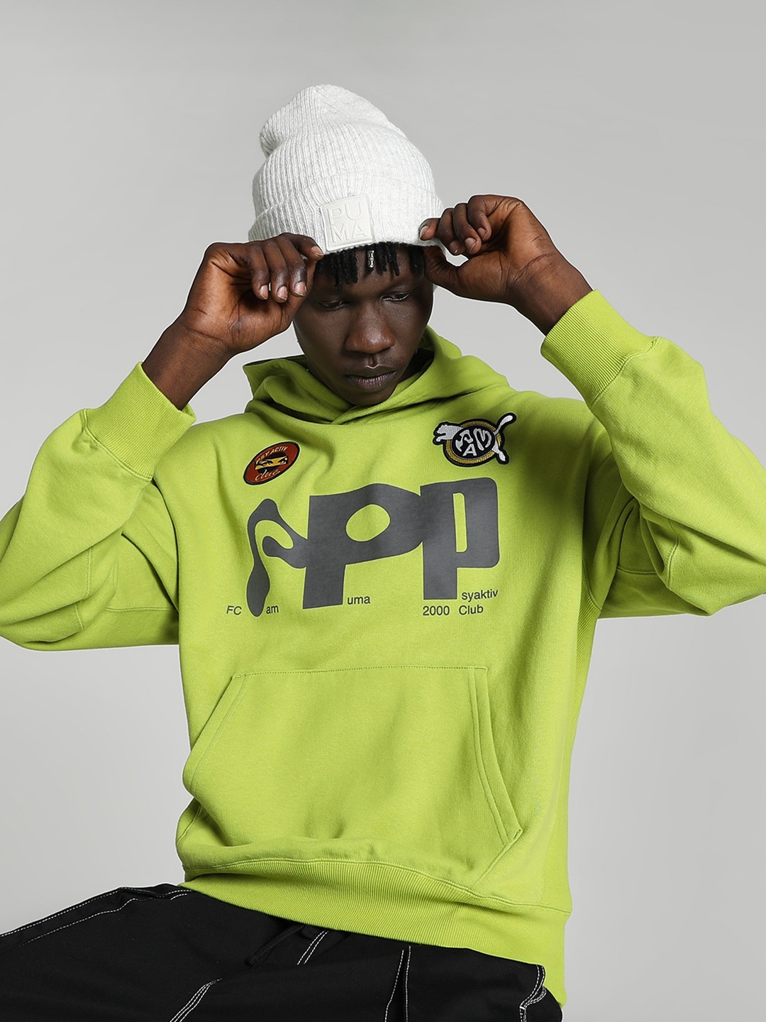 

Puma PUMA x PERKS AND MINI Typography Printed Hooded Cotton Pullover, Green