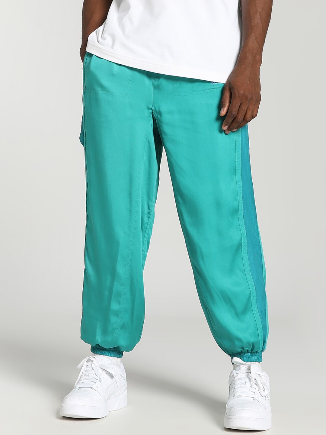 

Puma x KOCH Unisex Relaxed Fit Joggers, Turquoise blue