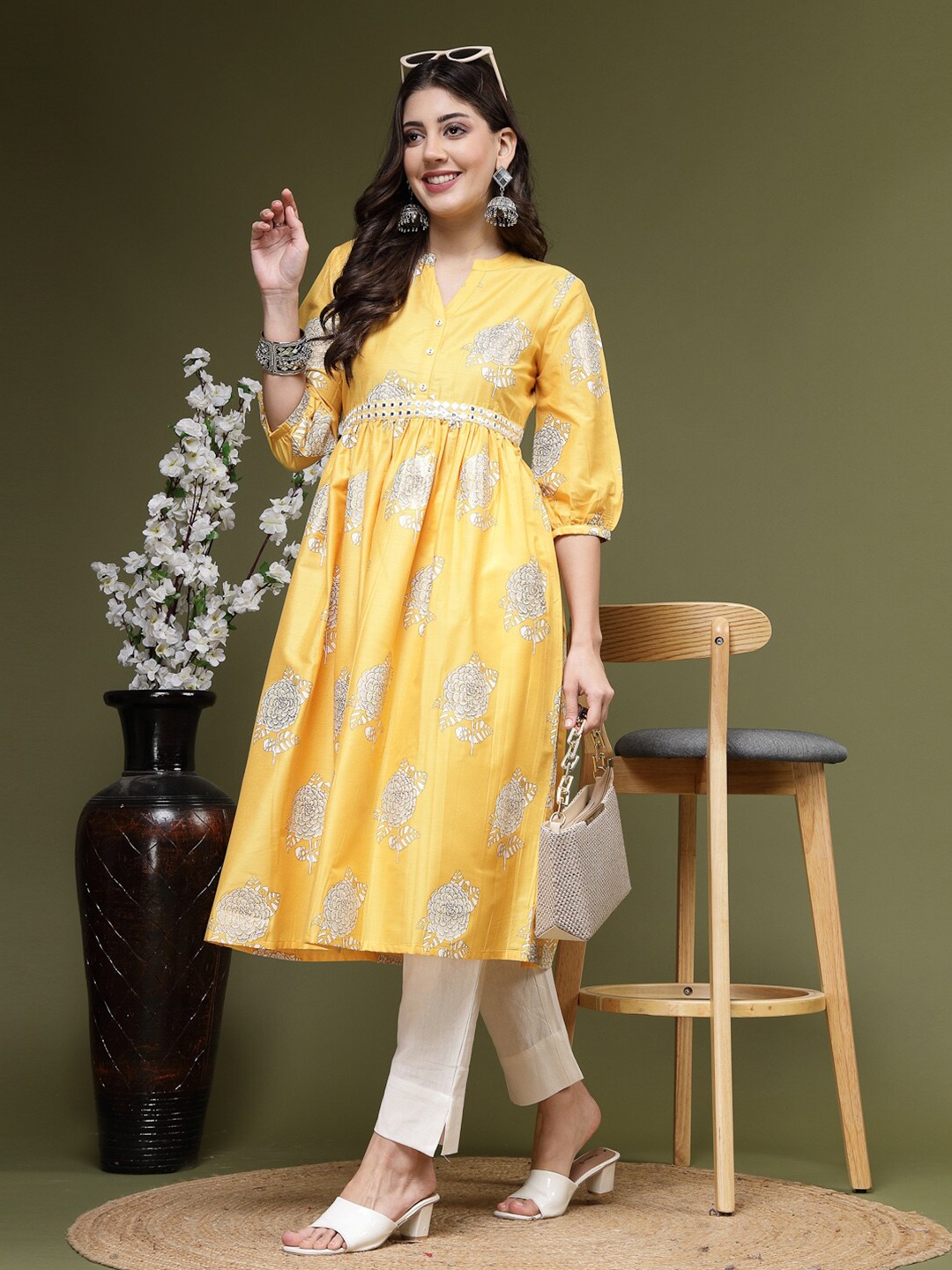 

Sangria Ethnic Motifs Printed Mandarin Collar Mirror Work A-Line Kurta, Yellow