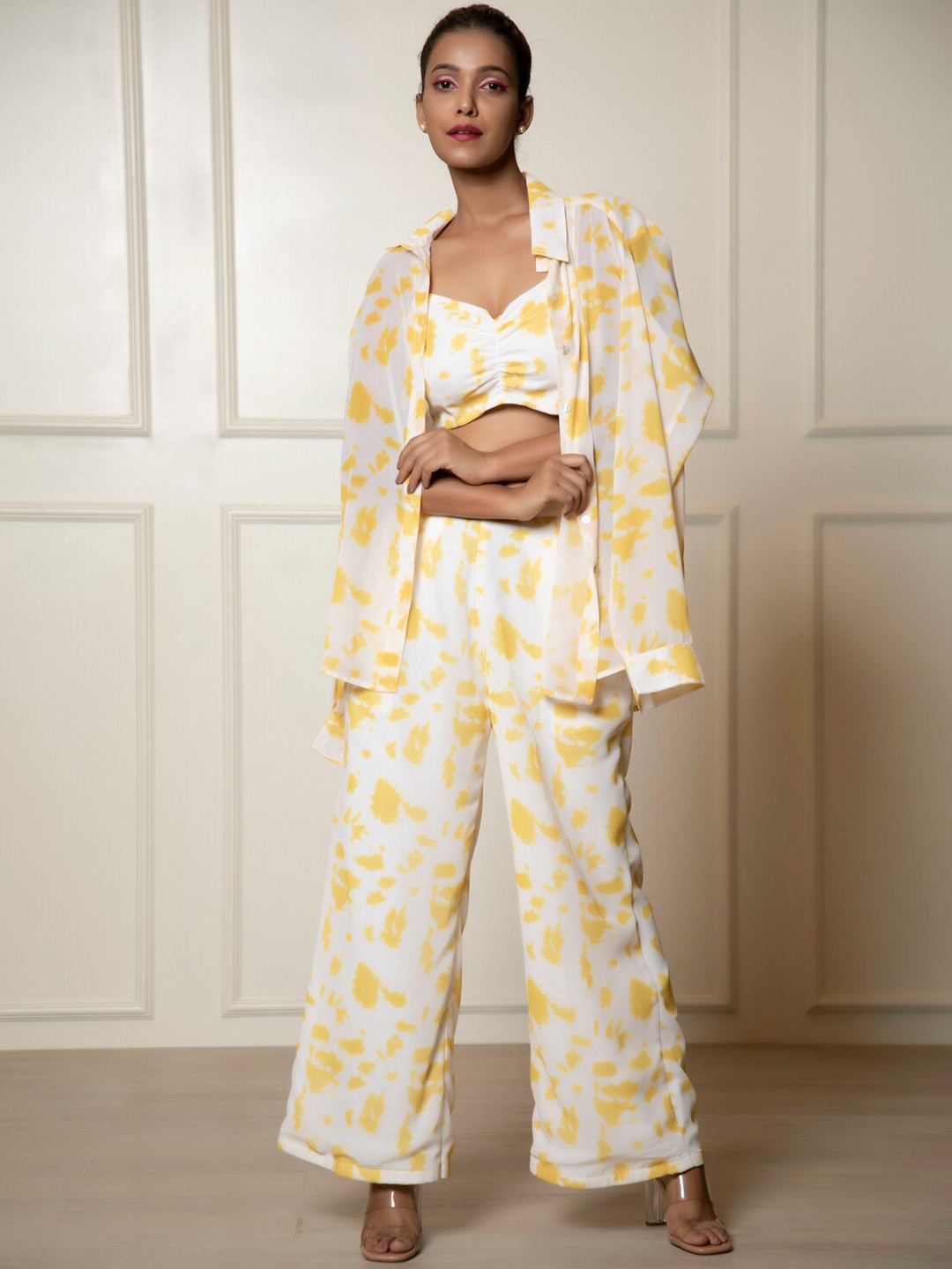 

Urban Sundari Printed Sweetheart Neck Crop Top & Flared Palazzo With Over Shirt Co-Ords, Yellow