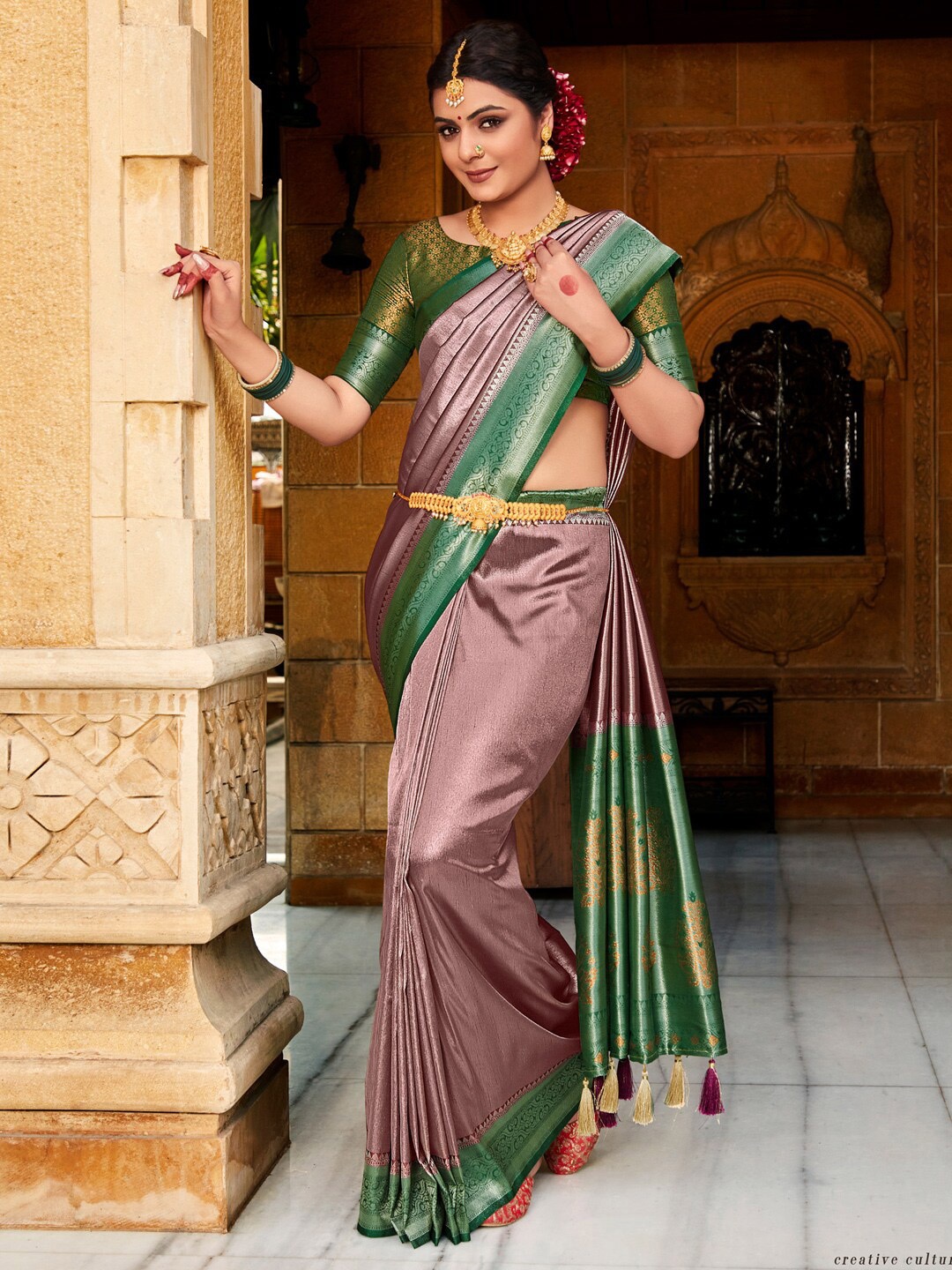 

Saree mall Mauve & Green Ethnic Motifs Woven Design Silk Blend Designer Kanjeevaram Sarees