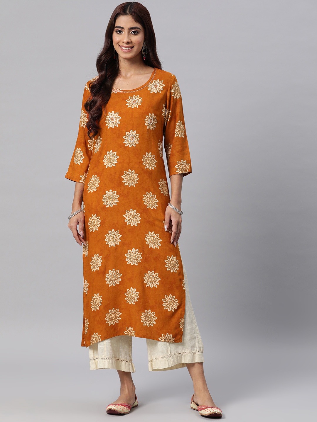 

Readiprint Fashions Women Floral Printed Mirror Work Kurta, Rust