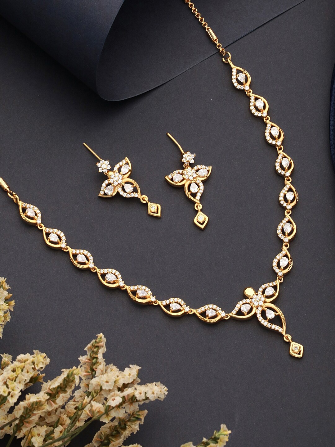 

Saraf RS Jewellery Gold-Plated American Diamond Stones Studded Floral Minimal Jewellery Set