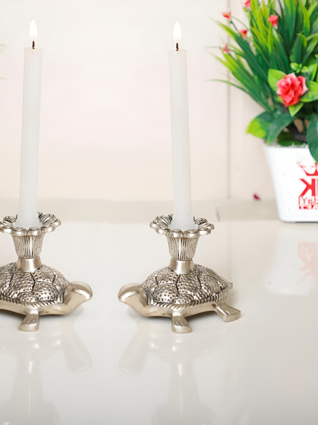 

Kridaykraft Silver-Toned 2 Pieces Tortoise Candle Holder Showpiece