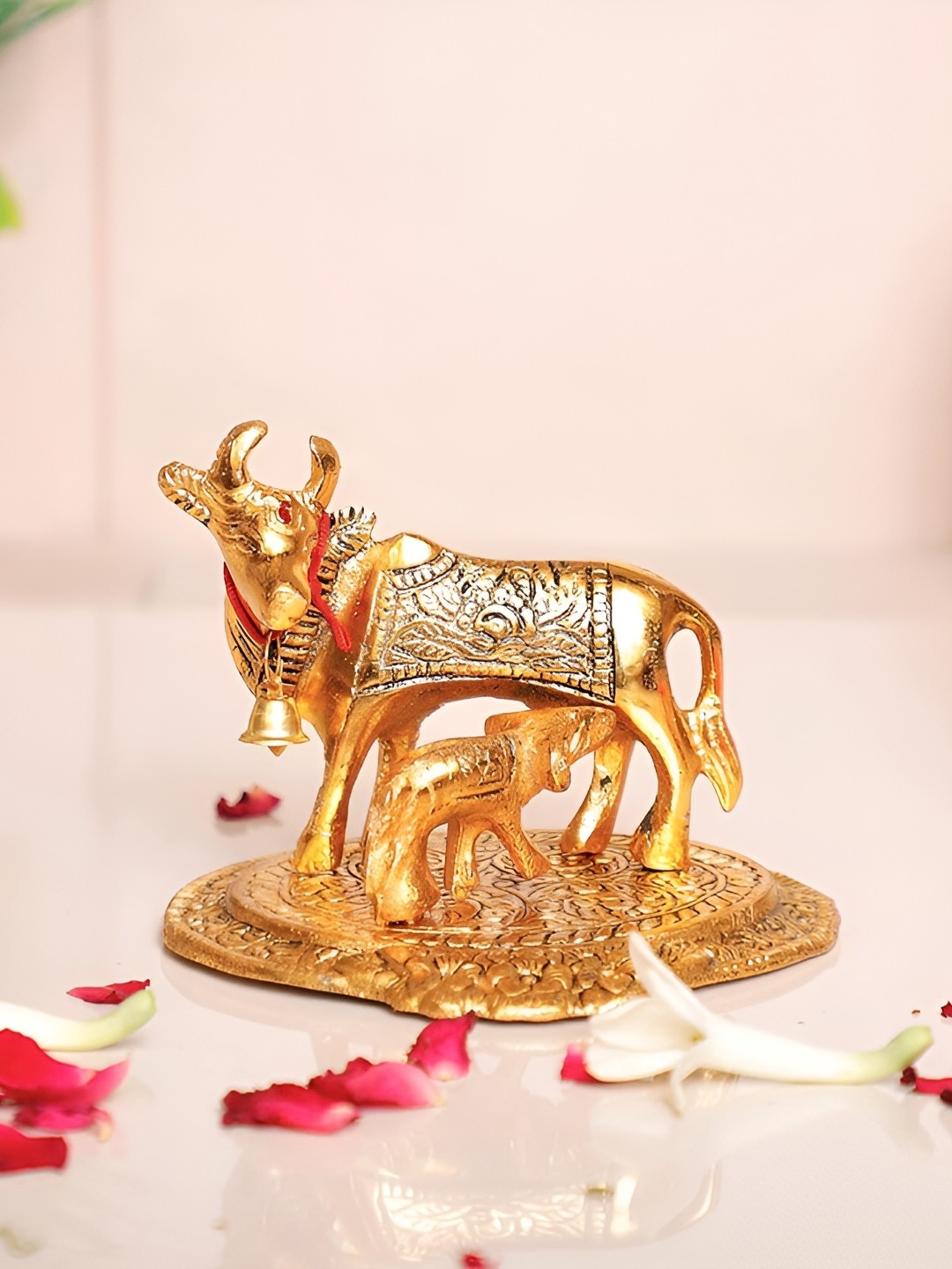 

Kridaykraft Gold-Toned Metal Kamdhenu Cow with Calf Standing Showpiece