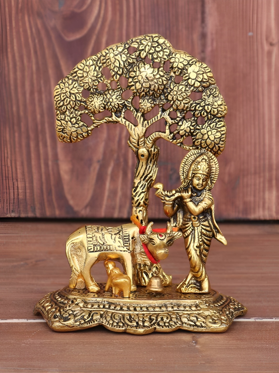 

Kridaykraft Gold-Toned Kamdhenu Cow & Calf with Bal Gopal Krishna Metal Showpiece