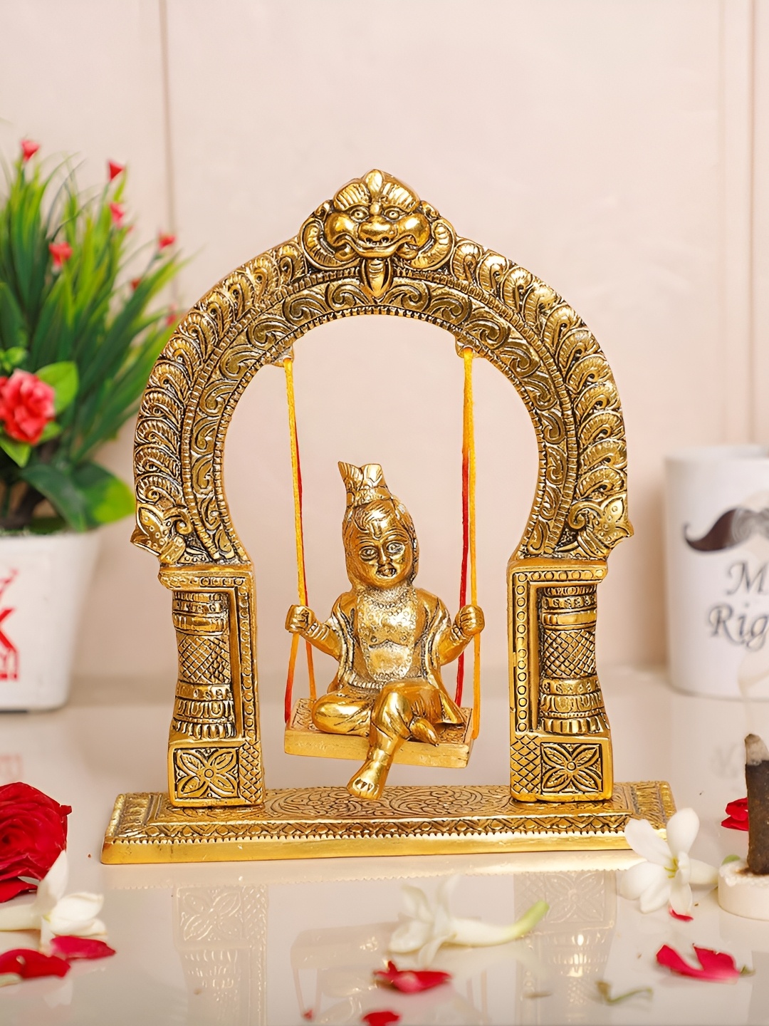 

Kridaykraft Gold-Toned Krishna Jhoola Showpiece