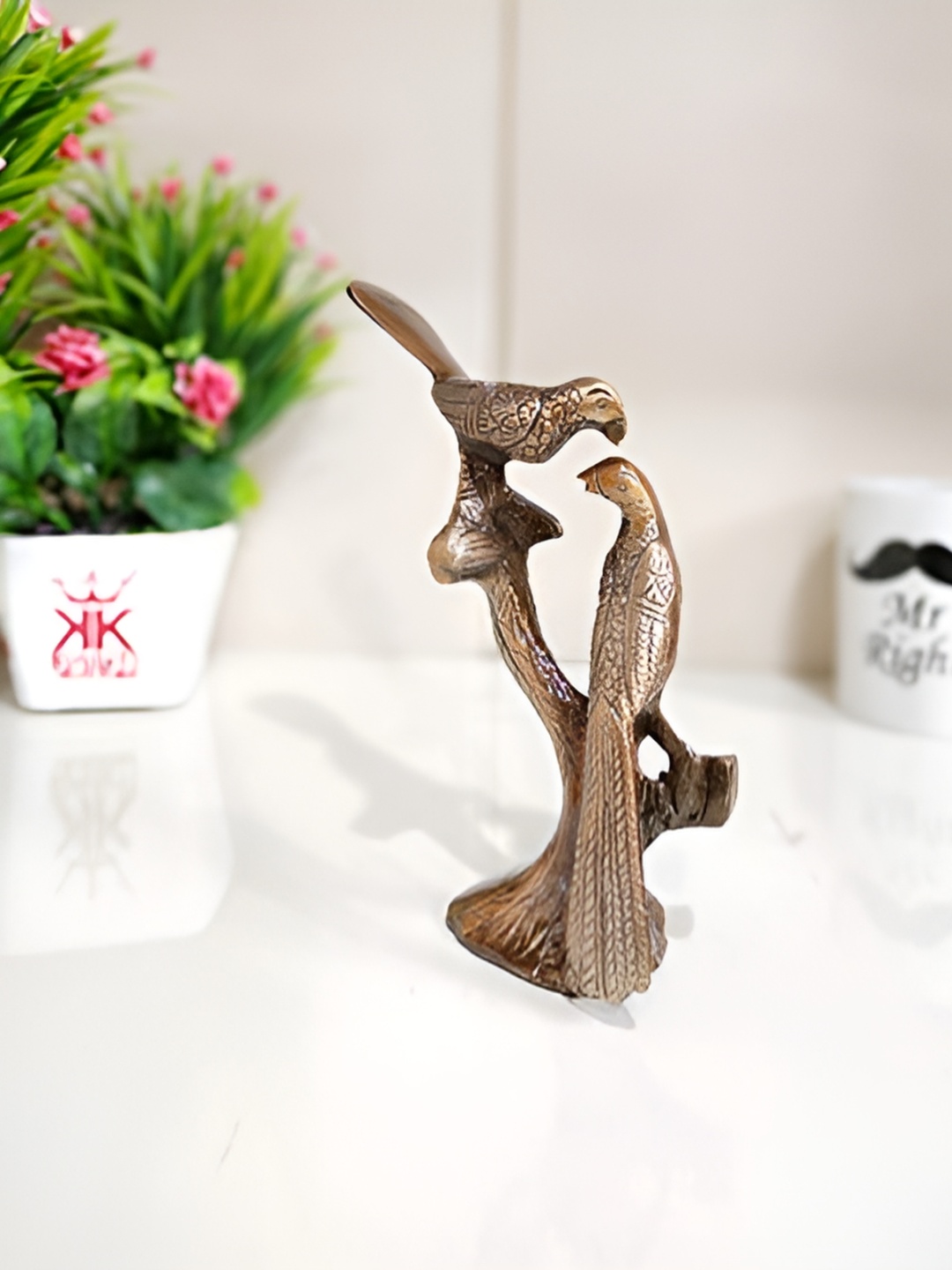 

Kridaykraft Copper-Toned Metal Love Birds Couple Kissing on Tree Branch Showpiece