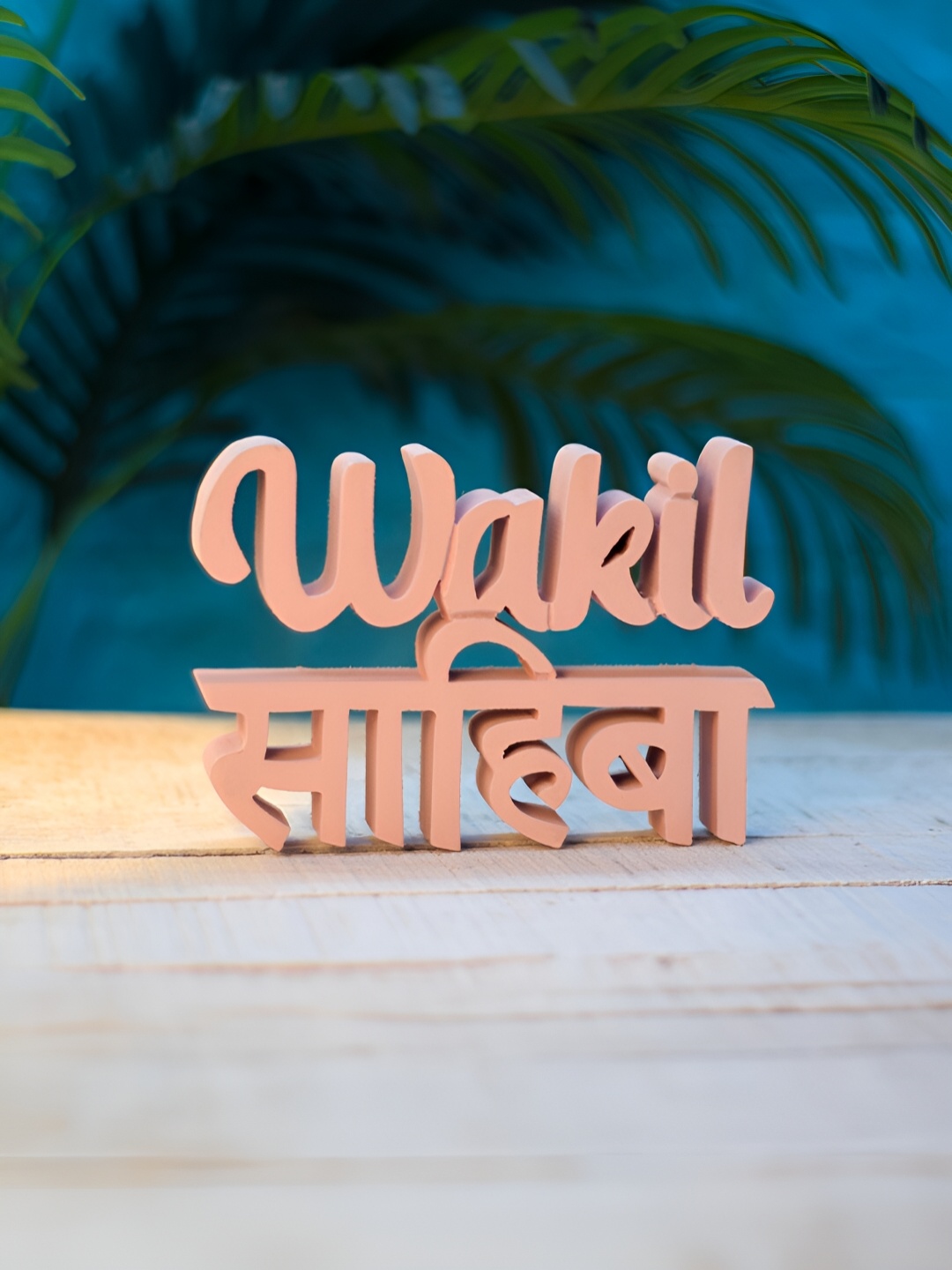 

Nukkad Tales Peach Wakil Sahiba Small Curio Showpiece