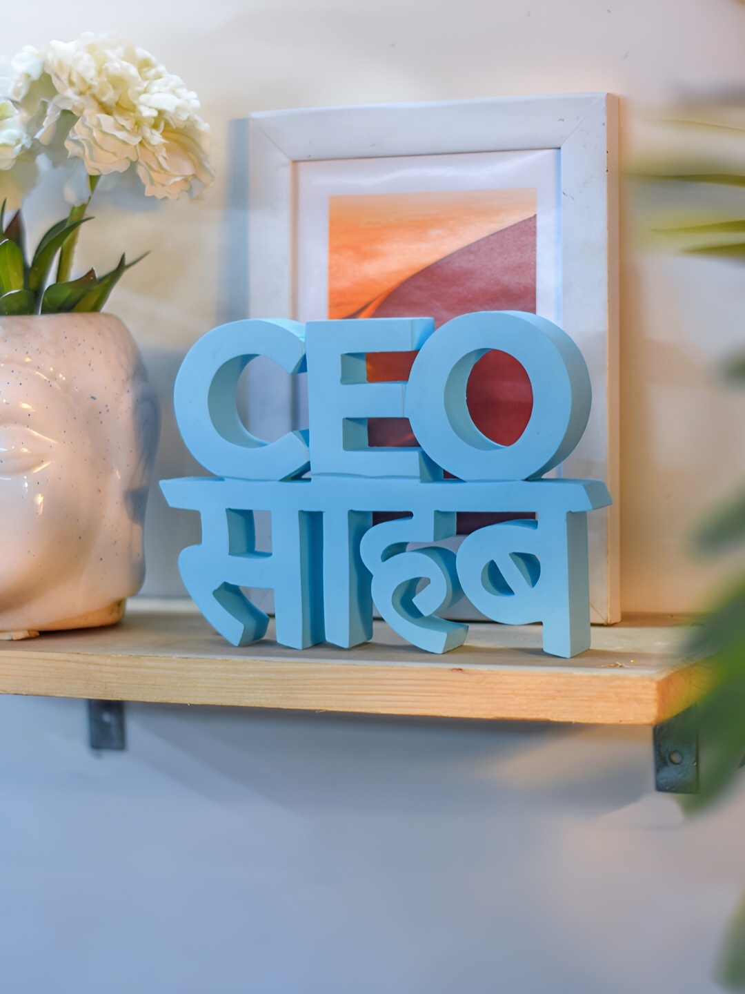 

Nukkad Tales Blue CEO Sahab Small Curio Showpiece